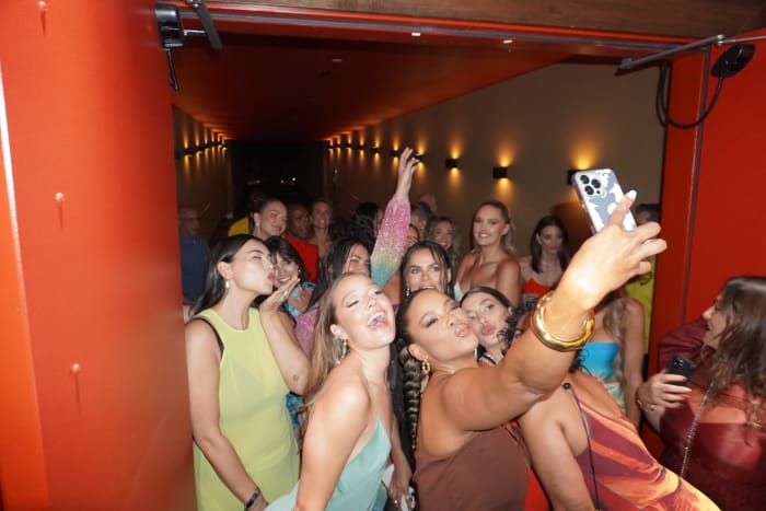 SI Swimsuit ‘23 models get ready for their on stage appearance.